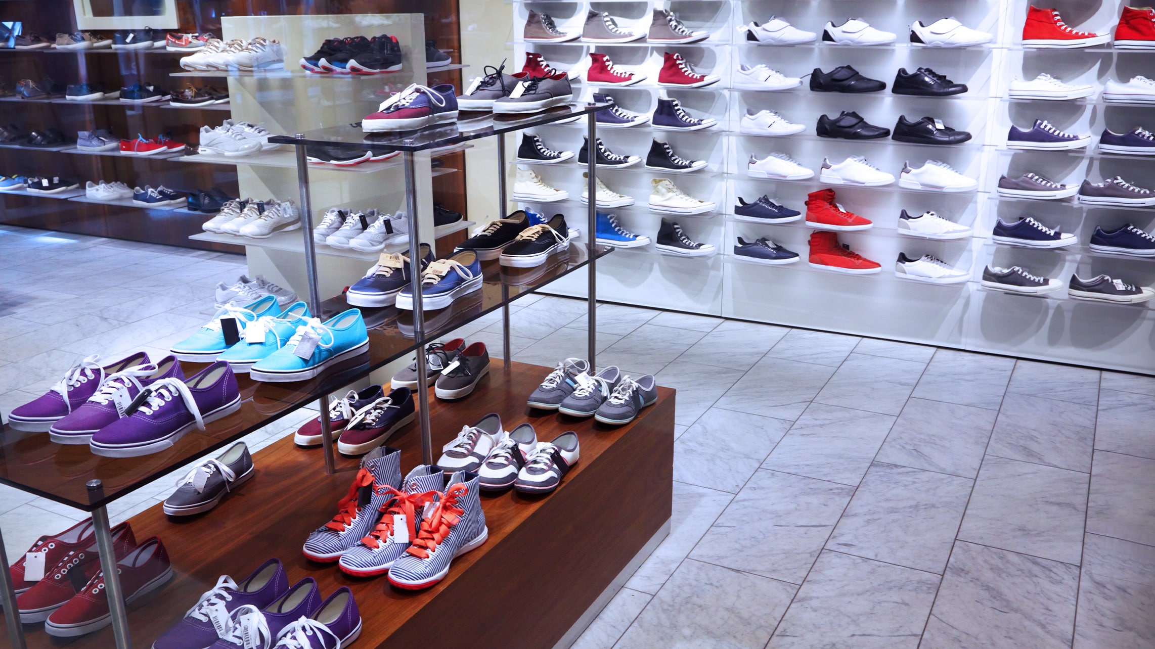 Sneakers displayed in a shoe store.
